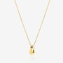 Side view of personalized 14K gold teardrop initial necklace showing engraved letter and diamond detail.