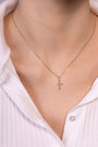 Model wearing Beaded Cross pendant in 14K gold, unisex jewelry NIK Jewellery Canada