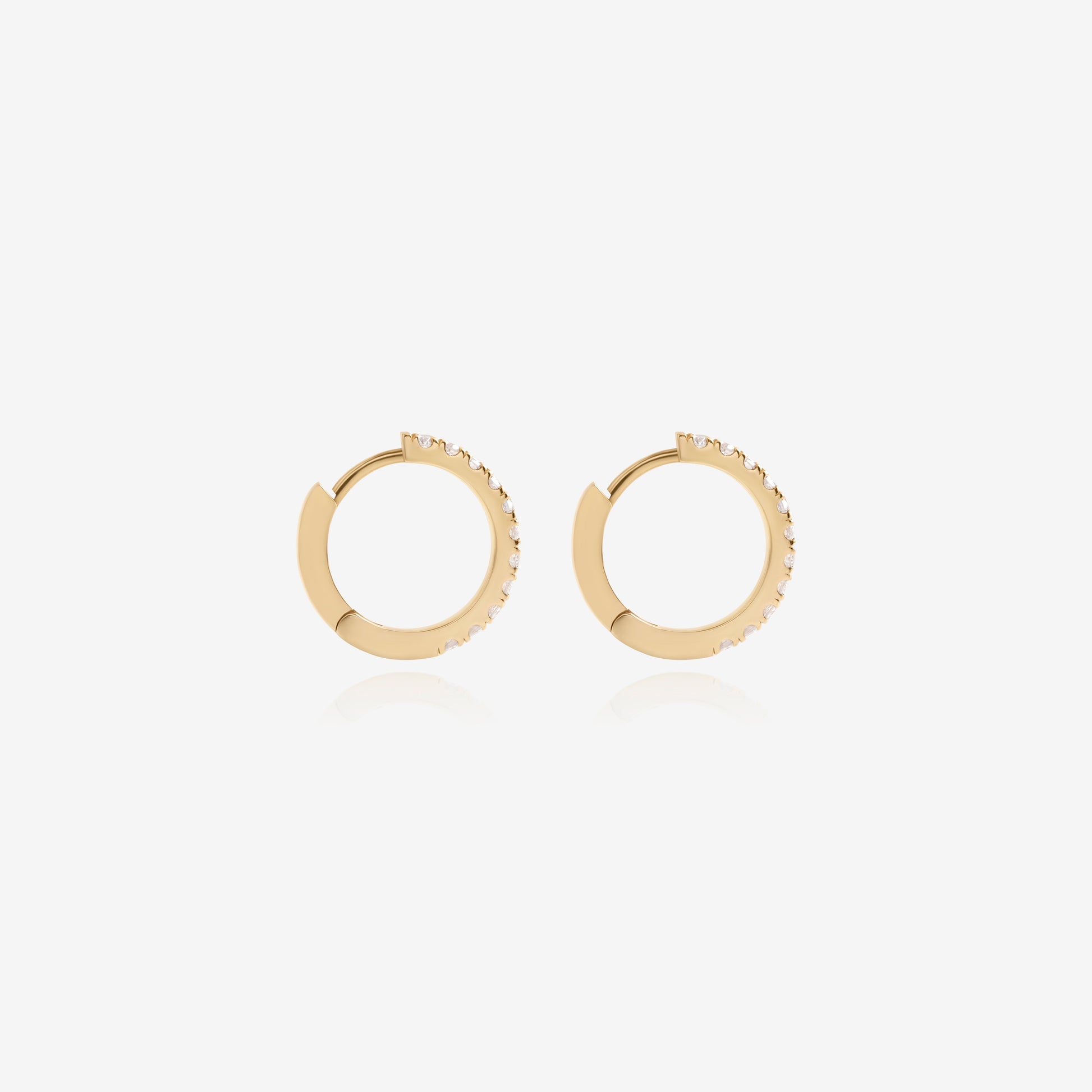 Nik Jewellery 14K gold diamond pavé hoop earrings, side view showing continuous diamond row.