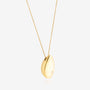 Nik Jewellery Astra gold vermeil pear diamond pendant necklace, angled view showing smooth domed profile.
