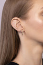 Nik Jewellery Axis 14K gold lab-grown diamond pavé curve earring worn on ear, showing length and fit.