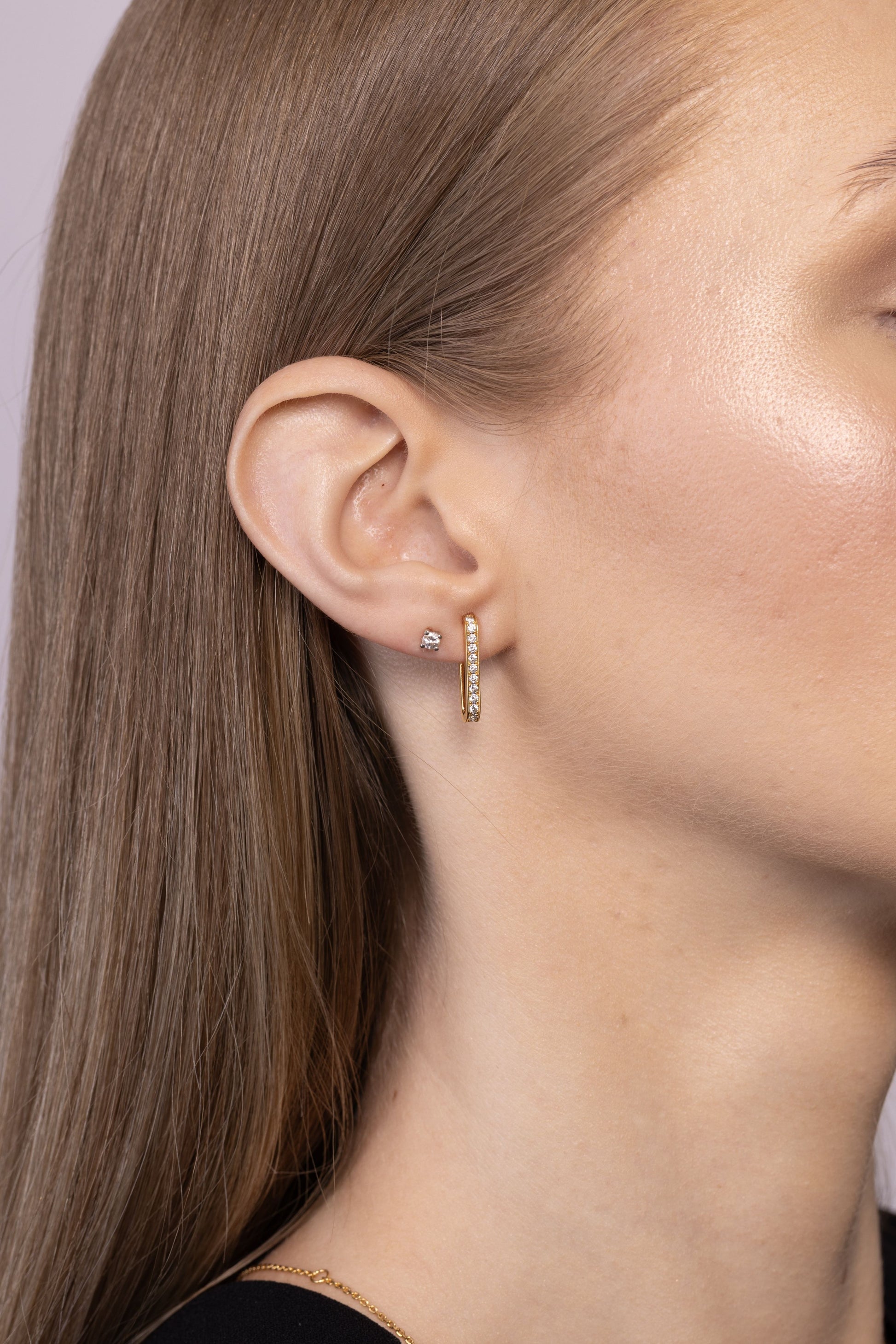 Nik Jewellery Axis 14K gold lab-grown diamond pavé curve earring worn on ear, showing length and fit.