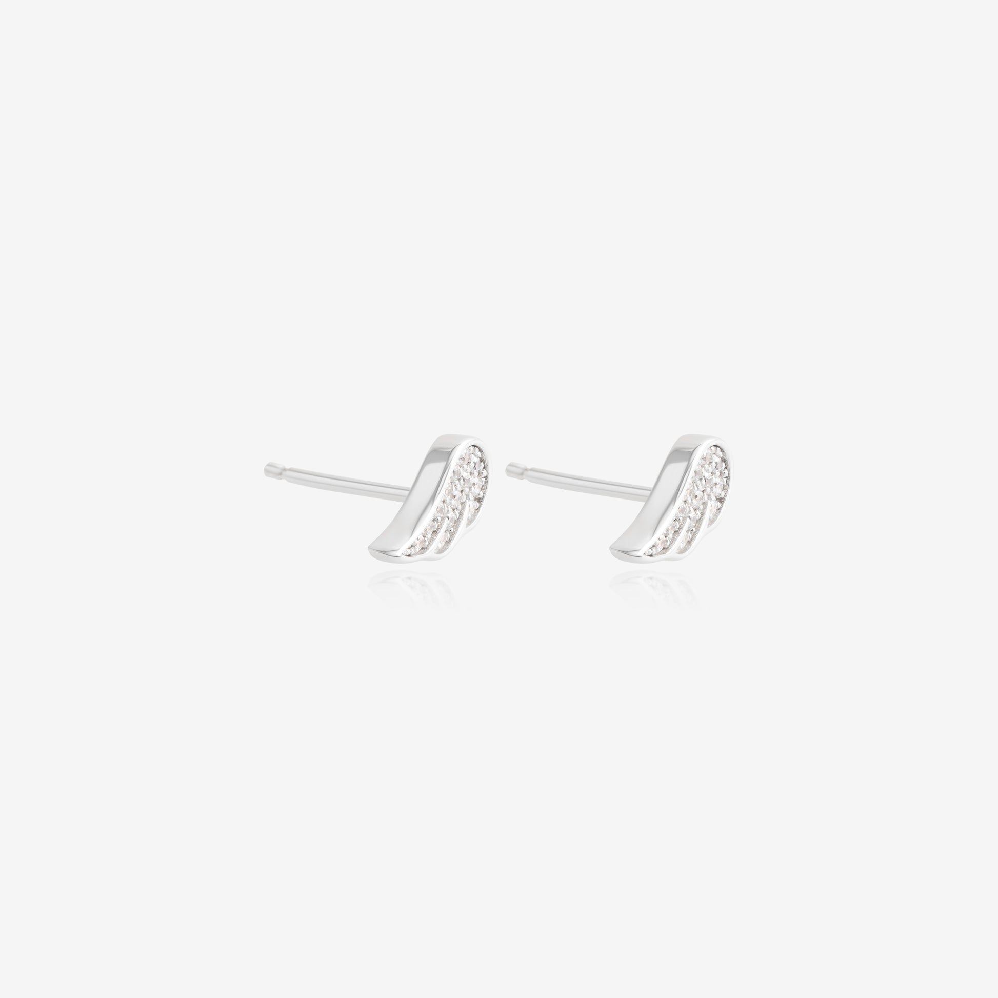 Nik Jewellery Celeste 14K white gold lab-grown diamond wing stud earrings, front detail showing pavé setting.