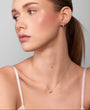 Nik Jewellery Lumen 18K gold bezel diamond necklace worn on neck with 16 inch chain, showing size and placement.