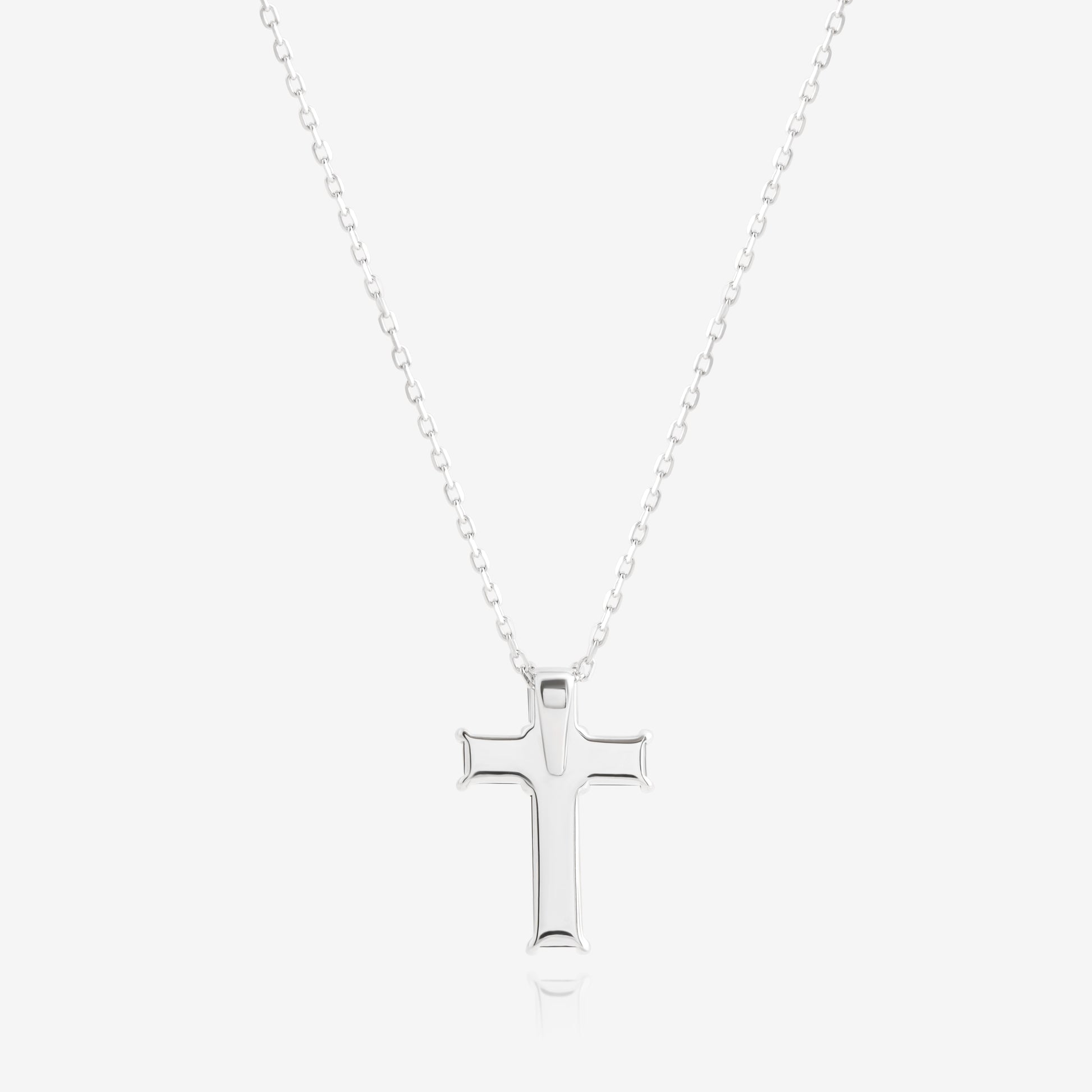 Nik Jewellery polished sterling silver cross pendant necklace without stones, back view.