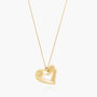 Nik Jewellery Seren gold vermeil open heart pendant necklace, angled view showing sculpted open heart shape.