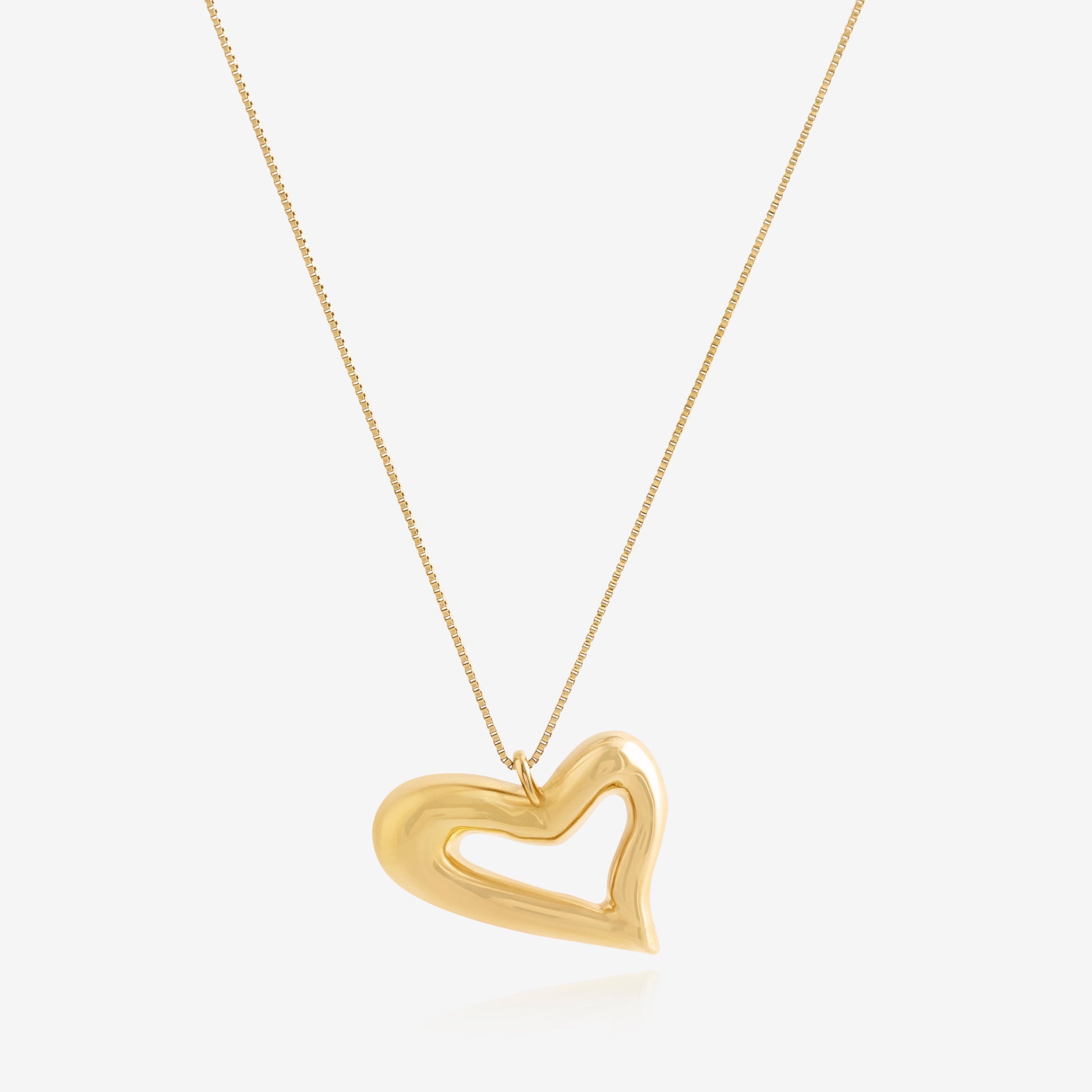 Nik Jewellery Seren gold vermeil open heart pendant necklace on fine chain, front view.