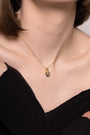 Nik Jewellery Solara 18K gold pearl diamond pendant necklace worn on neck with 16 inch chain, showing fit and length.
