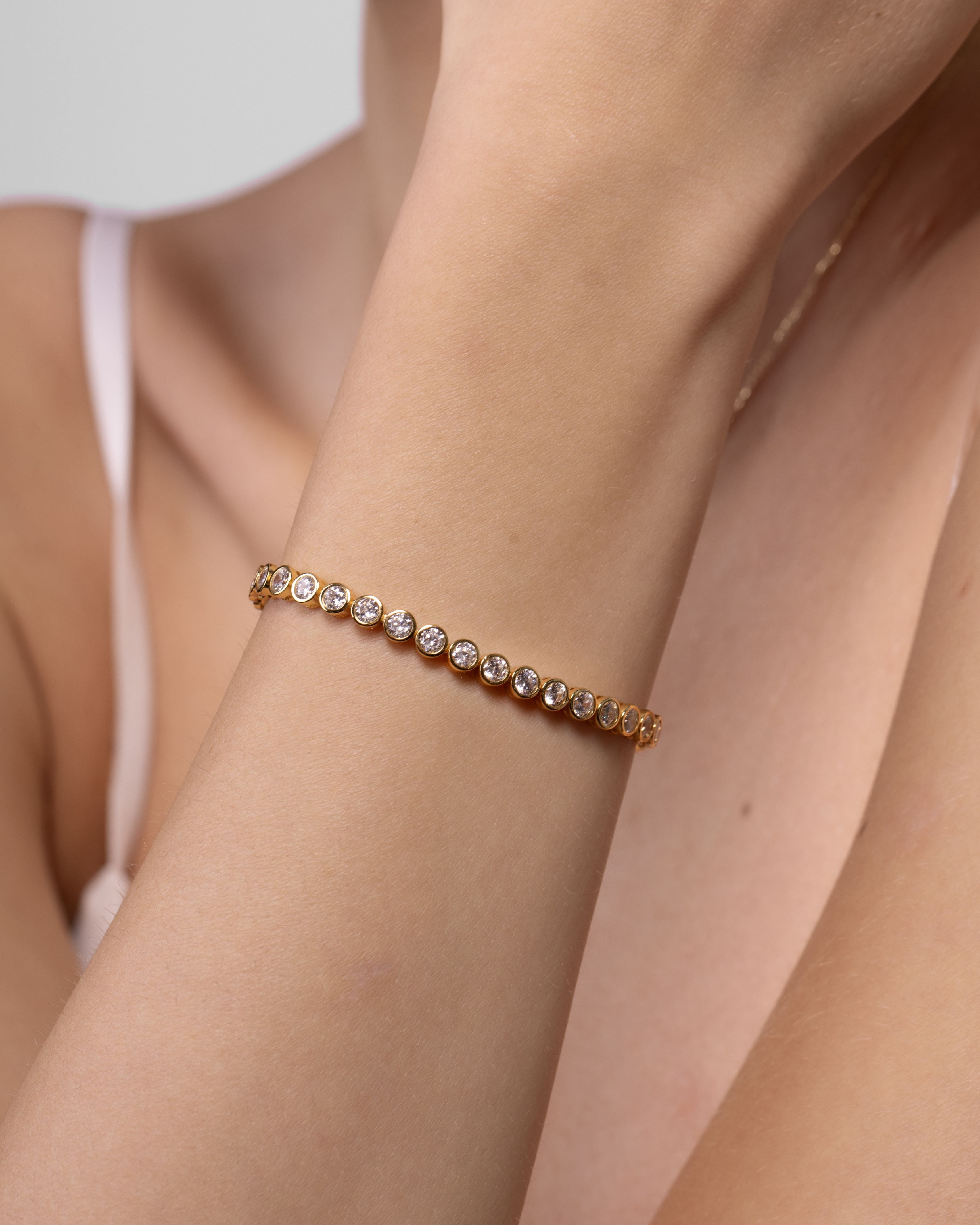 Nik Jewellery Solis 14K gold lab-grown diamond tennis bracelet worn on wrist, showing 6 inch fit.