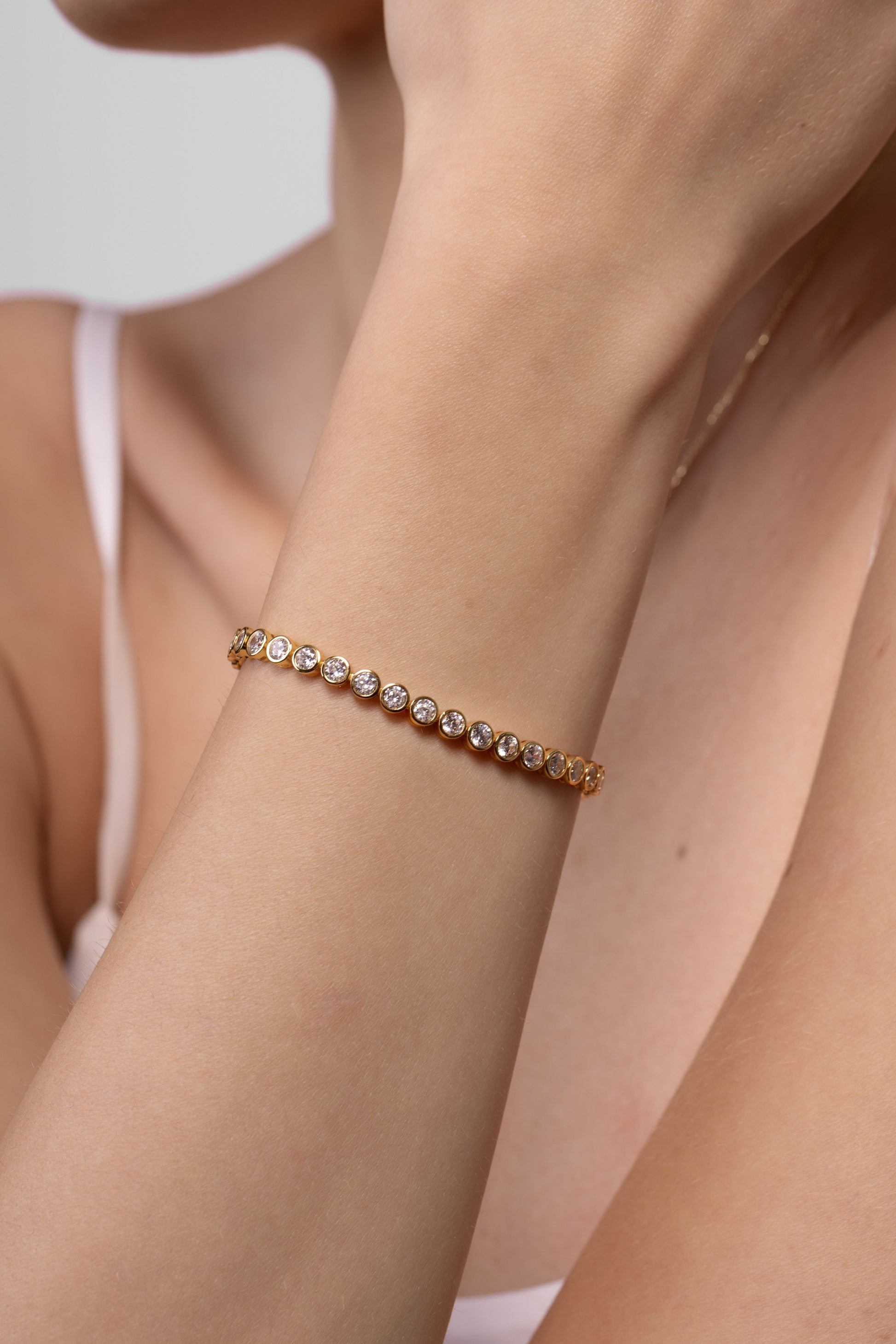 Nik Jewellery Solis 14K gold lab-grown diamond tennis bracelet worn on wrist, showing 6 inch fit.